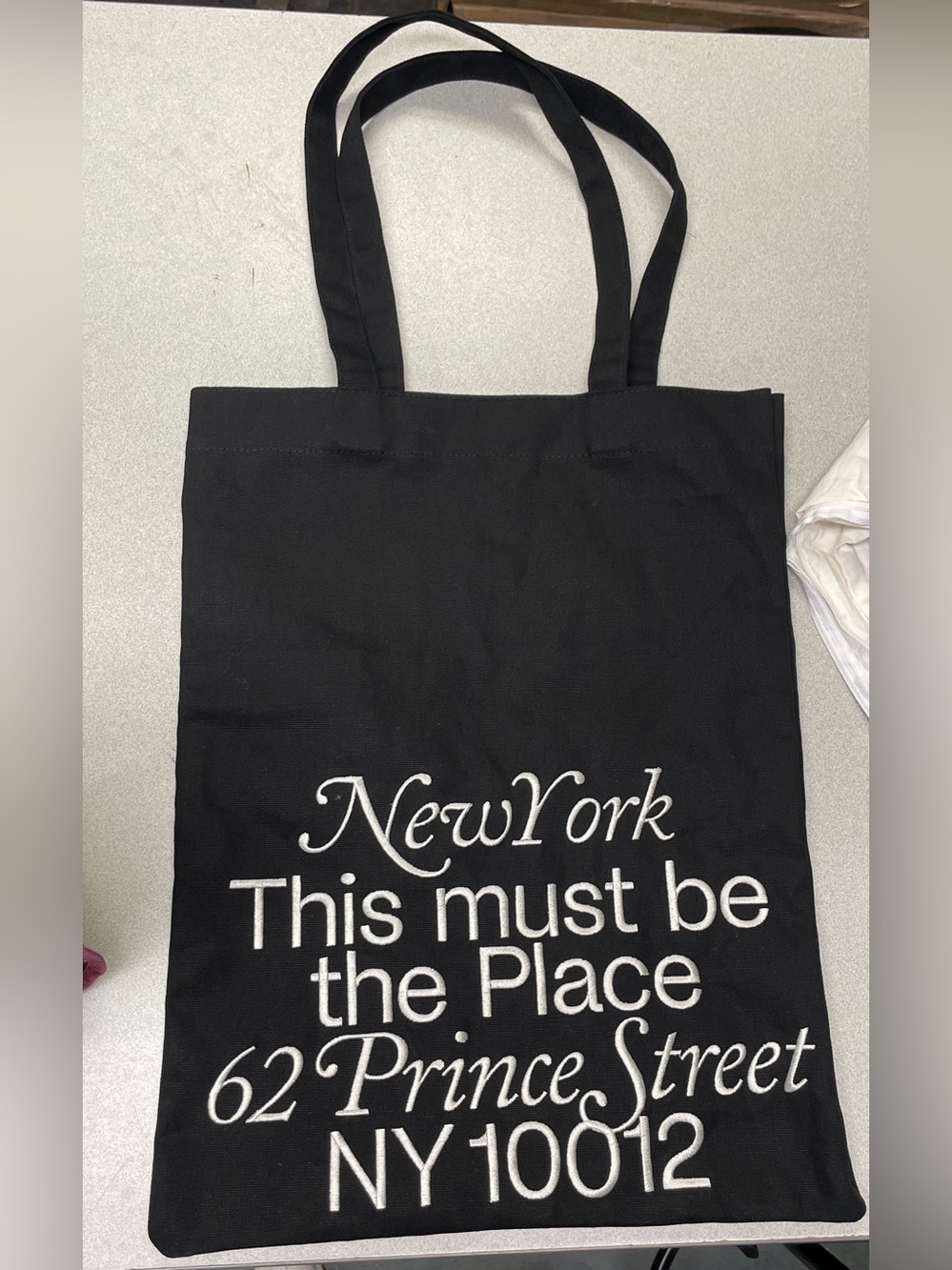 Black New York Script Tote Bag with White Text